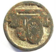Photograph of ancient Xiangqi Chariot piece with image